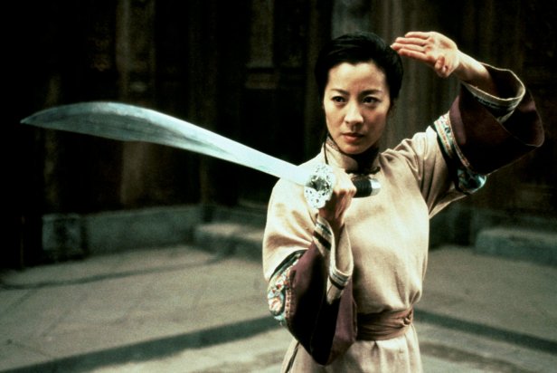 Film: Crouching Tiger, Hidden Dragon (2000), Starring Michelle Yeoh as Yu Shu Lien.   MICHELLE YEOH Film 'CROUCHING TIGER, HIDDEN DRAGON' (2000) Directed By ANG LEE 16 May 2000 CTQ52726 Allstar/Cinetext/SONY **WARNING** This photograph can only be reproduced by publications in conjunction with the promotion of the above film. For Editorial Use Only