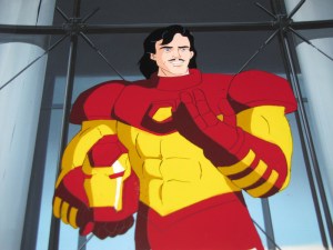 Iron-Man, looking distinctly dapper in his early 90's long hair and 'tache.